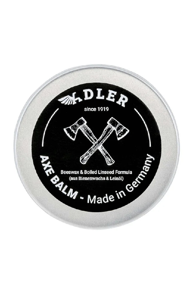 Adler Axt Balsam Detailaufnahme des Dosendeckels mit Produktpraegung