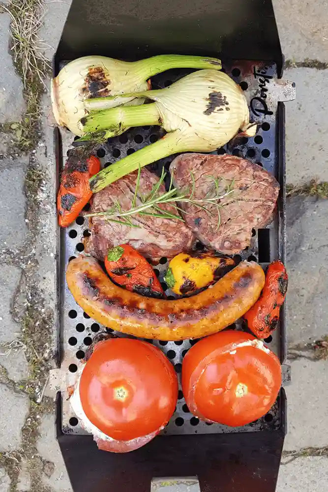 Porsti Original Edelstahl-Grill im Einsatz in der Outdoor-Küche beim Grillen und BBQ – robuster Premium-Grill für Garten und Camping