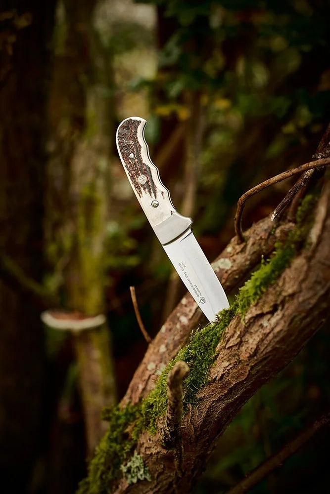 Puma IP Jagdmesser Hirschhorngriff traditionelles Jagdmesser fuer Jagd und Outdoor